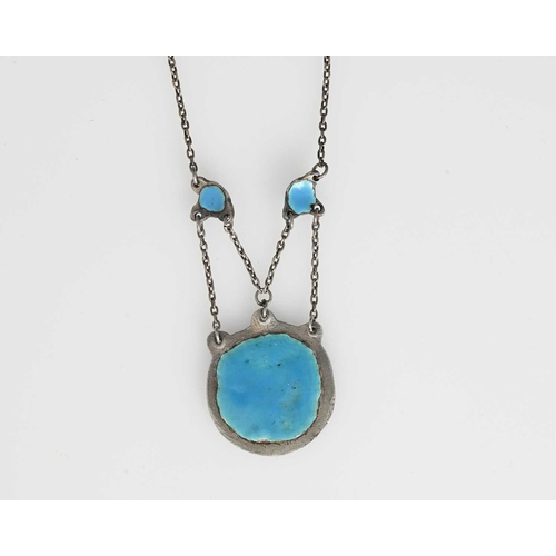 28 - An Arts and Crafts silver and enamelled necklace, in the style of Edith Dawson, the circular pendant... 