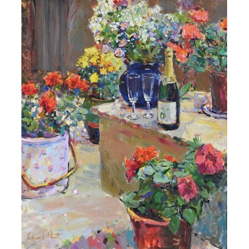 352 - Edward Noott (British, 1963), Champagne and Summer Flowers, signed l.l., titled verso, oil on canvas... 