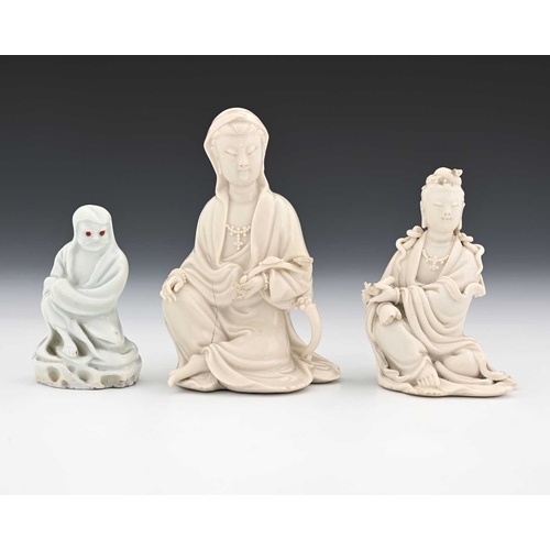 378 - Three Chinese blanc de Chine figures, including two Guanyin figures and one of Bodhidharma, 12cm hig... 