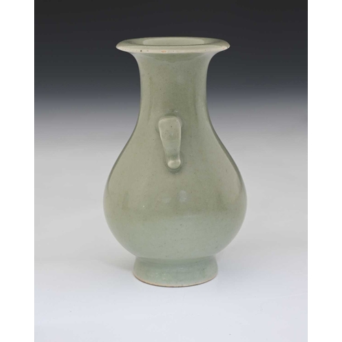 393 - A Chinese celadon glazed vase, Qianlong mark and possibly of the period, twin handled baluster form ... 