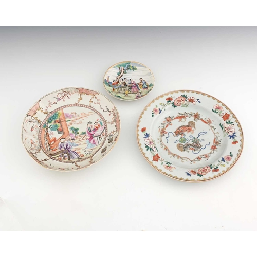 394 - Three Chinese famille rose plates, 18th century, including water carrier garden scene saucer in the ... 