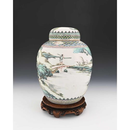 397 - A Chinese famille verte ginger jar and cover, Qianlong mark, painted in the round with figures in an... 