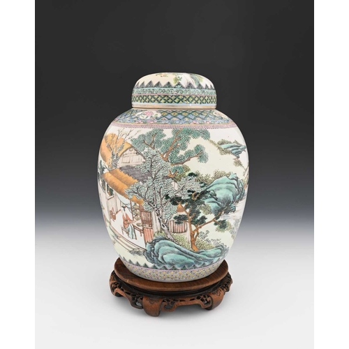 397 - A Chinese famille verte ginger jar and cover, Qianlong mark, painted in the round with figures in an... 