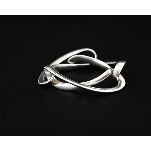 42 - Regitze Overgaard for Georg Jensen, a Danish Modernist silver Infinity bracelet, model 452, designed... 