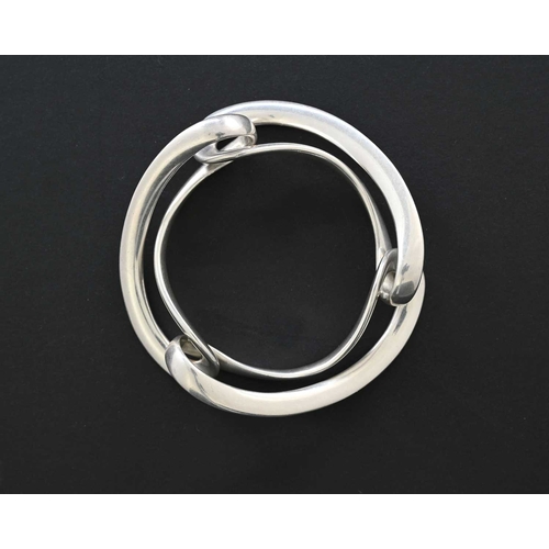 42 - Regitze Overgaard for Georg Jensen, a Danish Modernist silver Infinity bracelet, model 452, designed... 