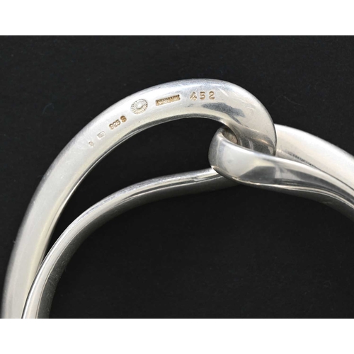 42 - Regitze Overgaard for Georg Jensen, a Danish Modernist silver Infinity bracelet, model 452, designed... 