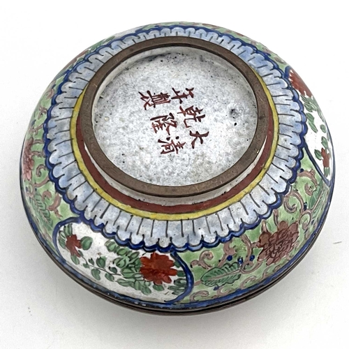 420 - A Chinese Canton enamelled box and cover, circular bun form, painted with two boys by a fence in a g... 