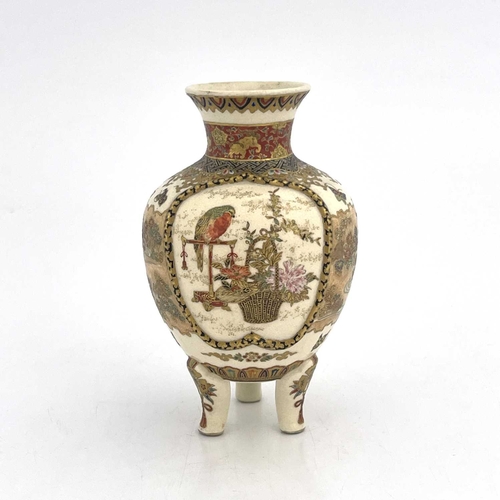 427 - A Japanese Satsuma vase, Meiji, shouldered ovoid form on three legs, painted with two vignettes of w... 