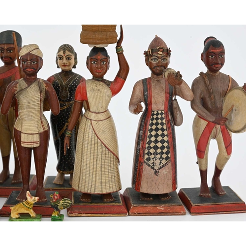 442 - A group of Indian wooden figures, late 19th Century or early 20th Century, each carved and realistic... 