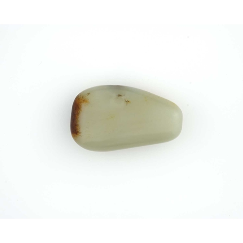 446 - A Chinese polished jade snuff bottle, tapered pebble form with rust inclusions and striations, 6.5cm