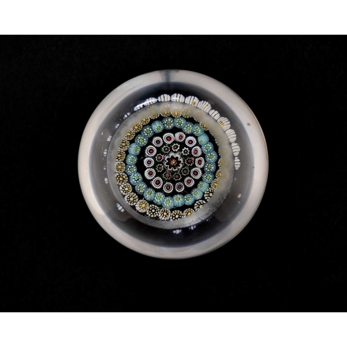 456 - Baccarat, a concentric millefiori glass paperweight, 19th century, four wreaths of variously coloure... 