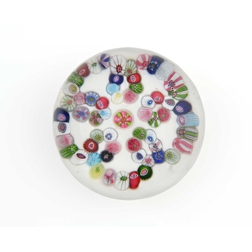 459 - Clichy, a Sodden Snow multi-cane garland glass paperweight, 19th century, decorated with a looped wr... 