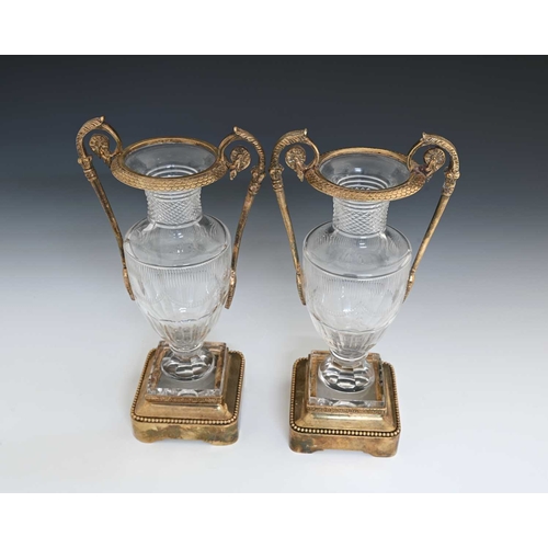 469 - A pair of Baccarat cut glass and ormolu mounted twin handled vases, of Neoclassical Empire form, 20t... 