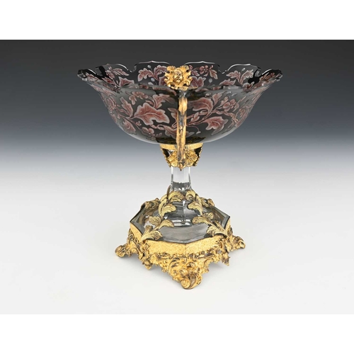 470 - An ormolu mounted intaglio flash cut pedestal tazza, the everted and ogee crenelated bowl etched and... 