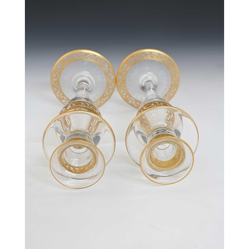 473 - Saint Louis, a pair of Thistle Gold glass candlesticks, hollow inverse baluster form with wide drip ... 