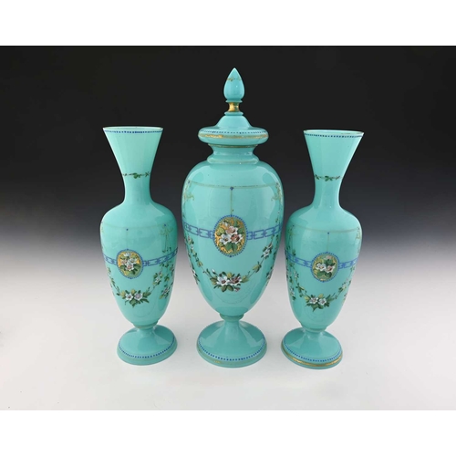 480 - A garniture of three Bohemian enamelled opaline glass vases, each of footed form in turquoise, paint... 