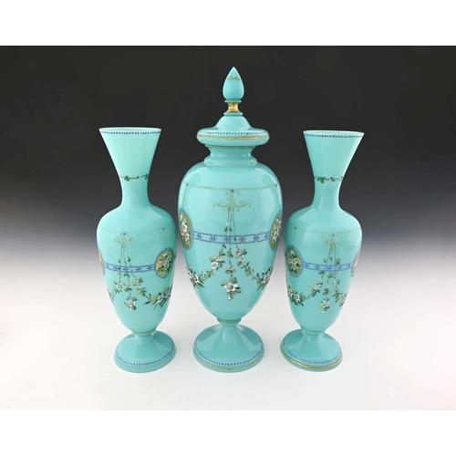 480 - A garniture of three Bohemian enamelled opaline glass vases, each of footed form in turquoise, paint... 