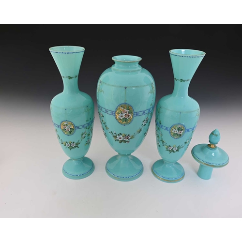 480 - A garniture of three Bohemian enamelled opaline glass vases, each of footed form in turquoise, paint... 