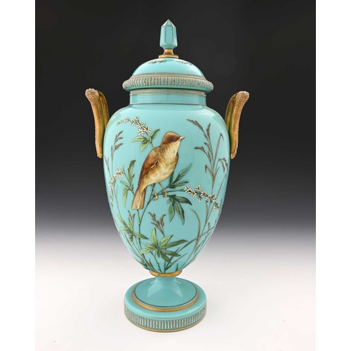 481 - A large Bohemian enamelled blue opaline glass vase and cover, probably Harrach, circa 1890, twin han... 