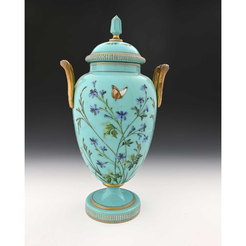 481 - A large Bohemian enamelled blue opaline glass vase and cover, probably Harrach, circa 1890, twin han... 