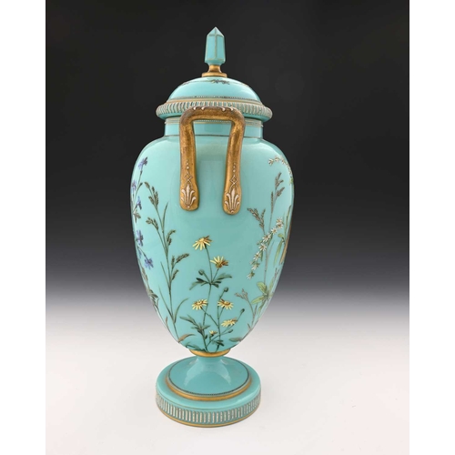 481 - A large Bohemian enamelled blue opaline glass vase and cover, probably Harrach, circa 1890, twin han... 