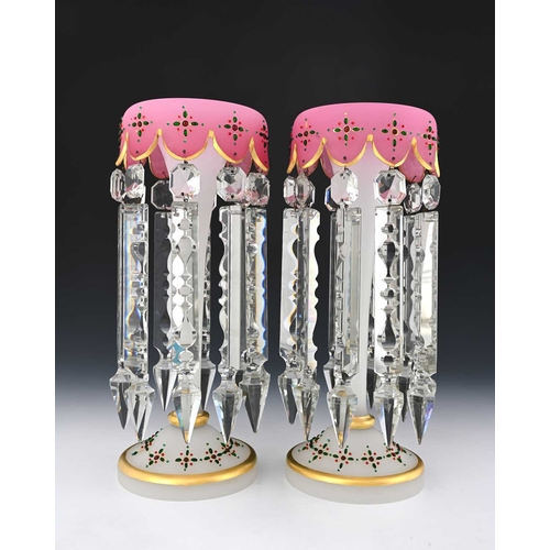 486 - A pair of jewelled pink blush satin opaline glass lustres footed trumpet form with turned rims, dent... 