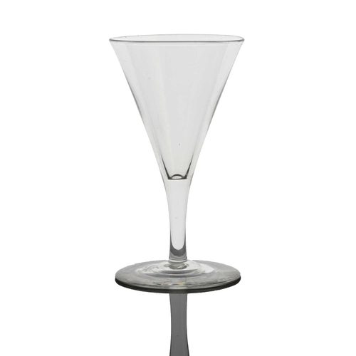 499 - Harry Powell for James Powell and Sons, Whitefriars, an Arts and Crafts wine glass, circa 1890, coni... 