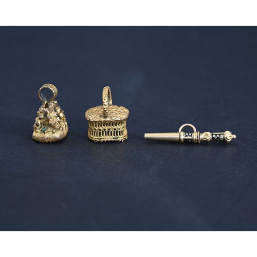 5 - Two George IV gilt metal seal fobs and a gold coloured metal and enamel miniature propelling pencil ... 