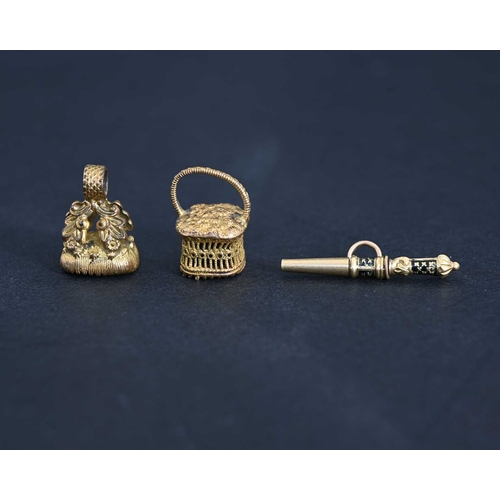 5 - Two George IV gilt metal seal fobs and a gold coloured metal and enamel miniature propelling pencil ... 