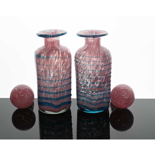 529 - Mdina, a pair of studio glass decanters, or bottles, circa 1980, hexagonal section bases, pink marbl... 