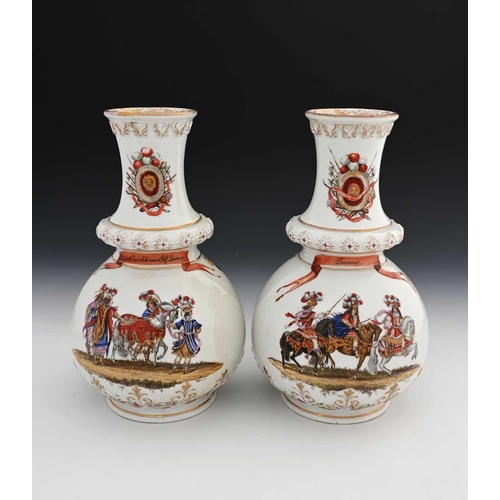 533 - A pair of Dresden baluster vases, late 19th Century, gilt moulded openings and knopped stems, each p... 