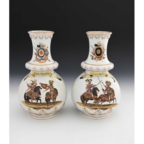 533 - A pair of Dresden baluster vases, late 19th Century, gilt moulded openings and knopped stems, each p... 