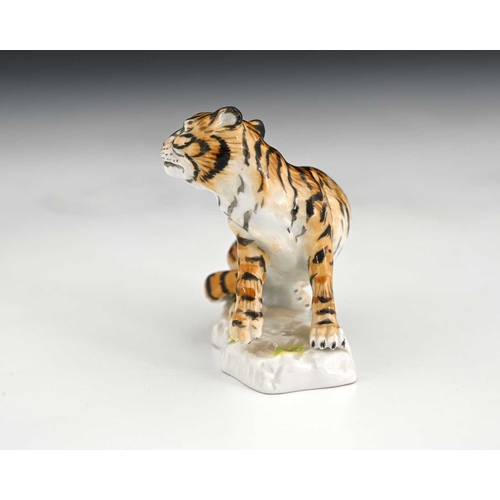 534 - A Meissen figure of a tiger, 20th century, model 1471, underglaze blue mark and stamped numbers, 6.5... 