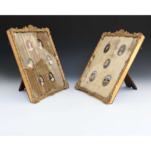 537 - A pair of Rococo gilt framed easel displays containing porcelain miniatures, 19th Century, one conta... 