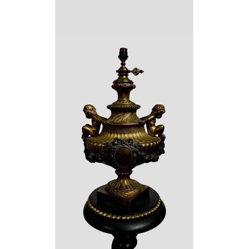 538 - A large Sevres style lamp base, gilt and brown basalt Solomonic column and urn form with cartouche o... 