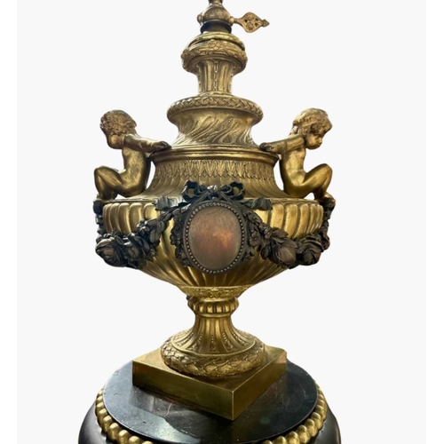 538 - A large Sevres style lamp base, gilt and brown basalt Solomonic column and urn form with cartouche o... 