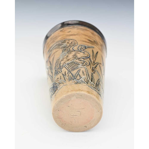 551 - Hannah Barlow for Doulton Lambeth, a stoneware beaker, 1877, sgraffito decorated with storks in a we... 