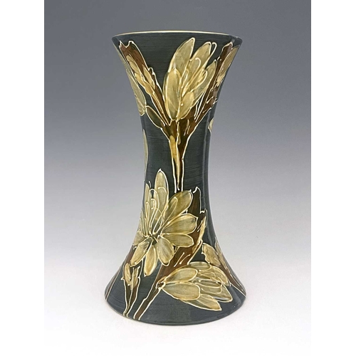 559 - Dean for Thomas Forester and Sons, an Art Pottery slip decorated vase, circa 1910, waisted form, dec... 