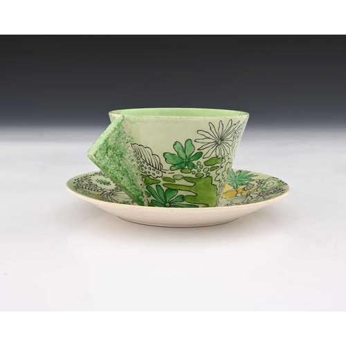 563b - Clarice Cliff, a Crepe de Chene cup and saucer