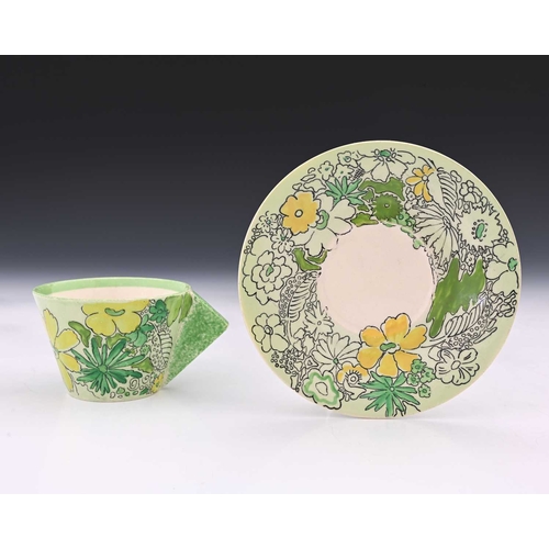 563b - Clarice Cliff, a Crepe de Chene cup and saucer