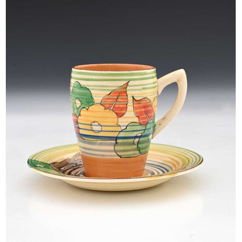 563c - Clarice Cliff, a Capri cup and saucer