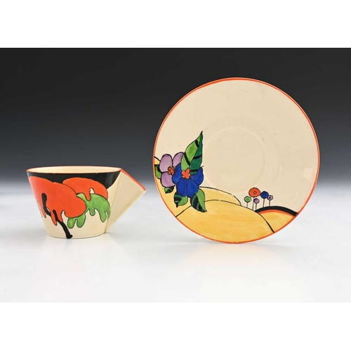 564b - Clarice Cliff, a Woodlands cup and saucer