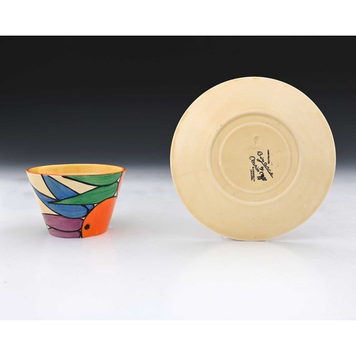 566c - Clarice Cliff, an Oranges tea cup and saucer, conical form