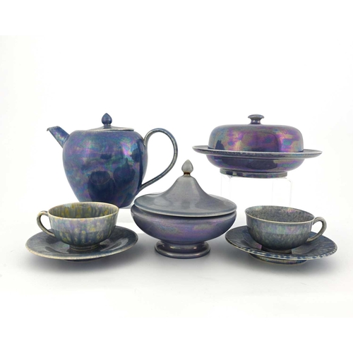 583 - Ruskin Pottery, a collection of Lustre tea wares, circa 1920s, in lavender glaze, including teapot, ... 