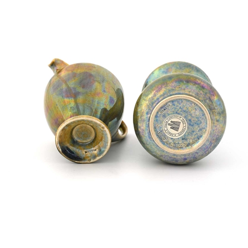 584 - Ruskin Pottery, two Lustre glazed vessels, 1923 and 1926, including a bulbous vase with trumpet neck... 