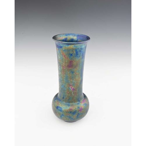 587 - Ruskin Pottery, a Kingfisher blue lustre vase, 1925, bulbous form with elongated cylindrical neck an... 