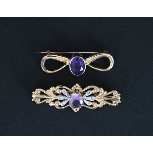 6 - Two gold and amethyst brooches, including a 9 carat foliate bar brooch with diamond chips and centra... 