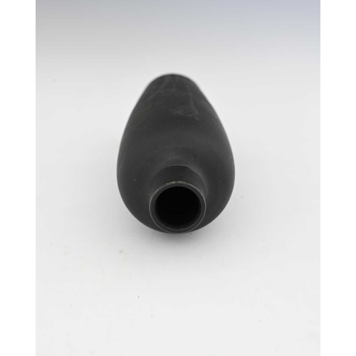 601 - Ruskin Pottery, a black matte glazed vase, 1917, shouldered form, painted with sprigs of wild flower... 