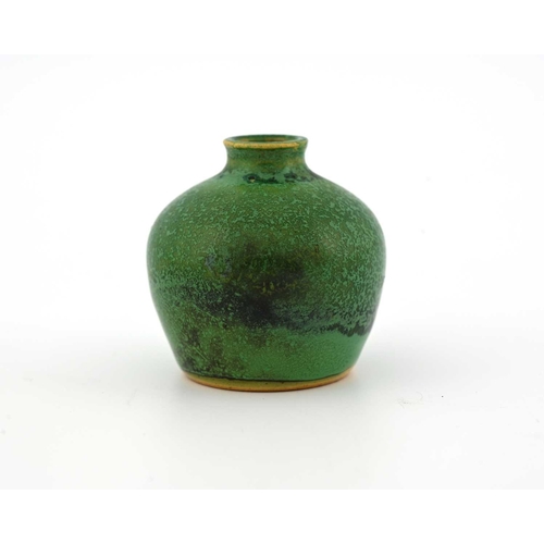 604 - Ruskin Pottery, a miniature Souffle glazed vase, shouldered ovoid form, circa 1905, mottled green ov... 