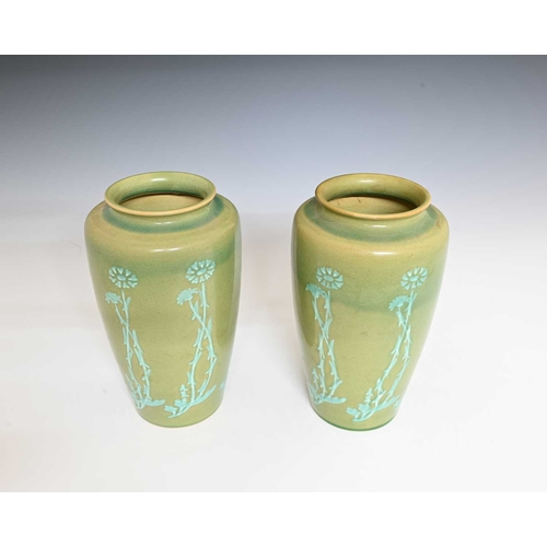 608 - Ruskin Pottery, a pair of slip stencilled Souffle Glaze vases, circa 1901, shouldered form, decorate... 